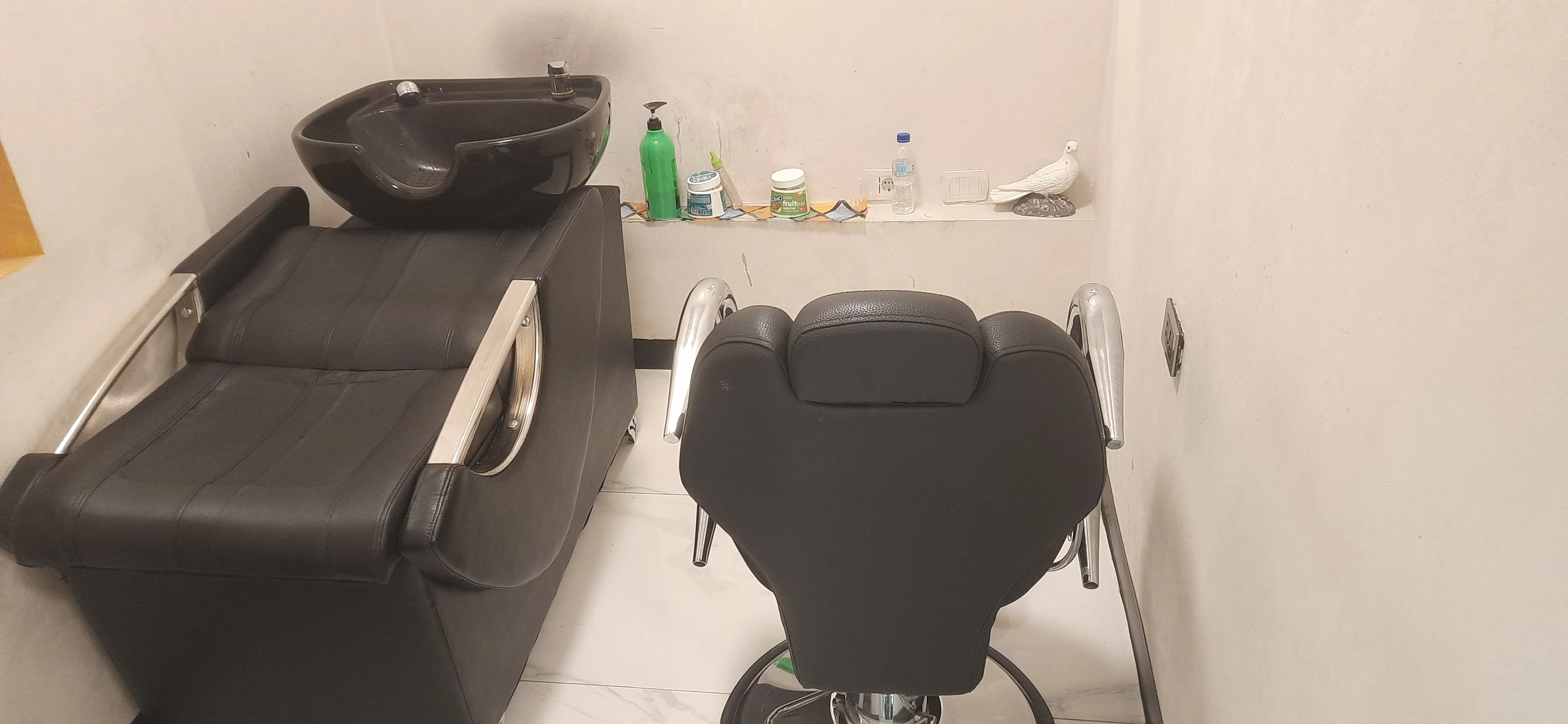 A clean and modern hair washing station.