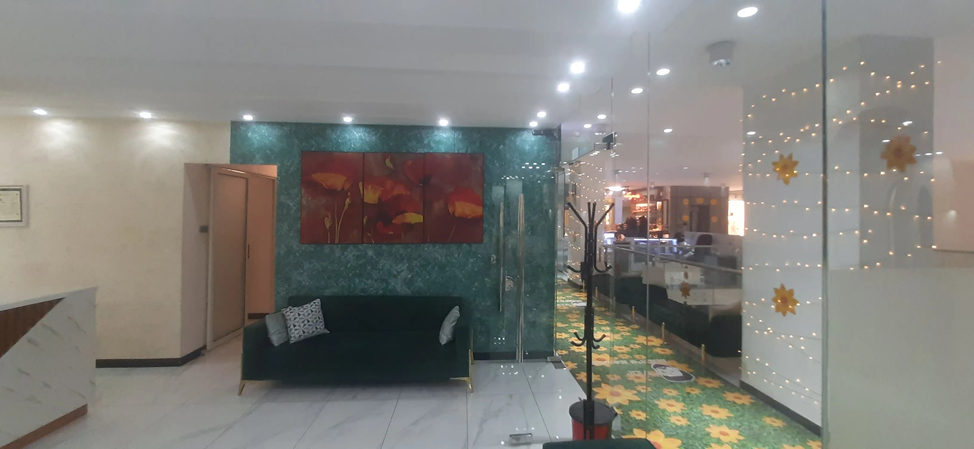 Comfortable salon waiting area at AJ VIP Men's Salon